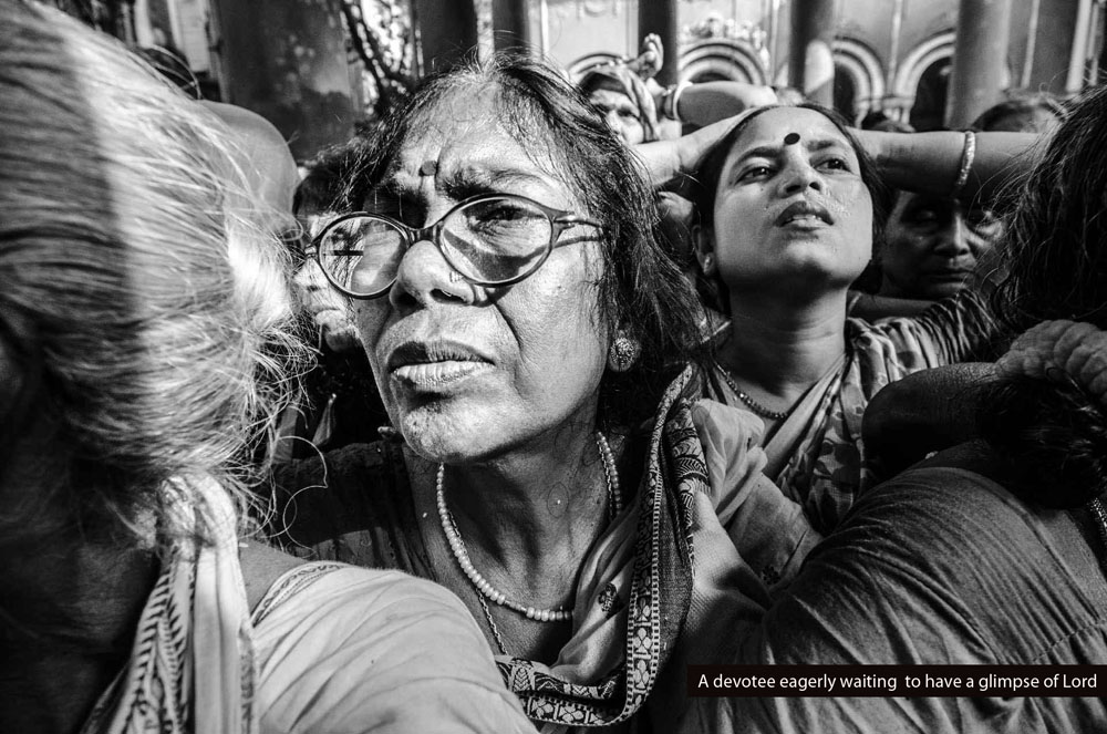 8.A devotee eagerly waiting  to have a glimpse of Lord.