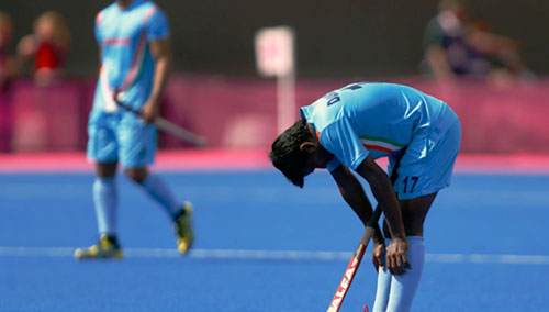 India's Mujtaba reacts after their men's Group B hockey match against New Zealand at the London 2012 Olympic Games at the Riverbank Arena on the Olympic Park